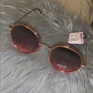 Gold framed sunglasses